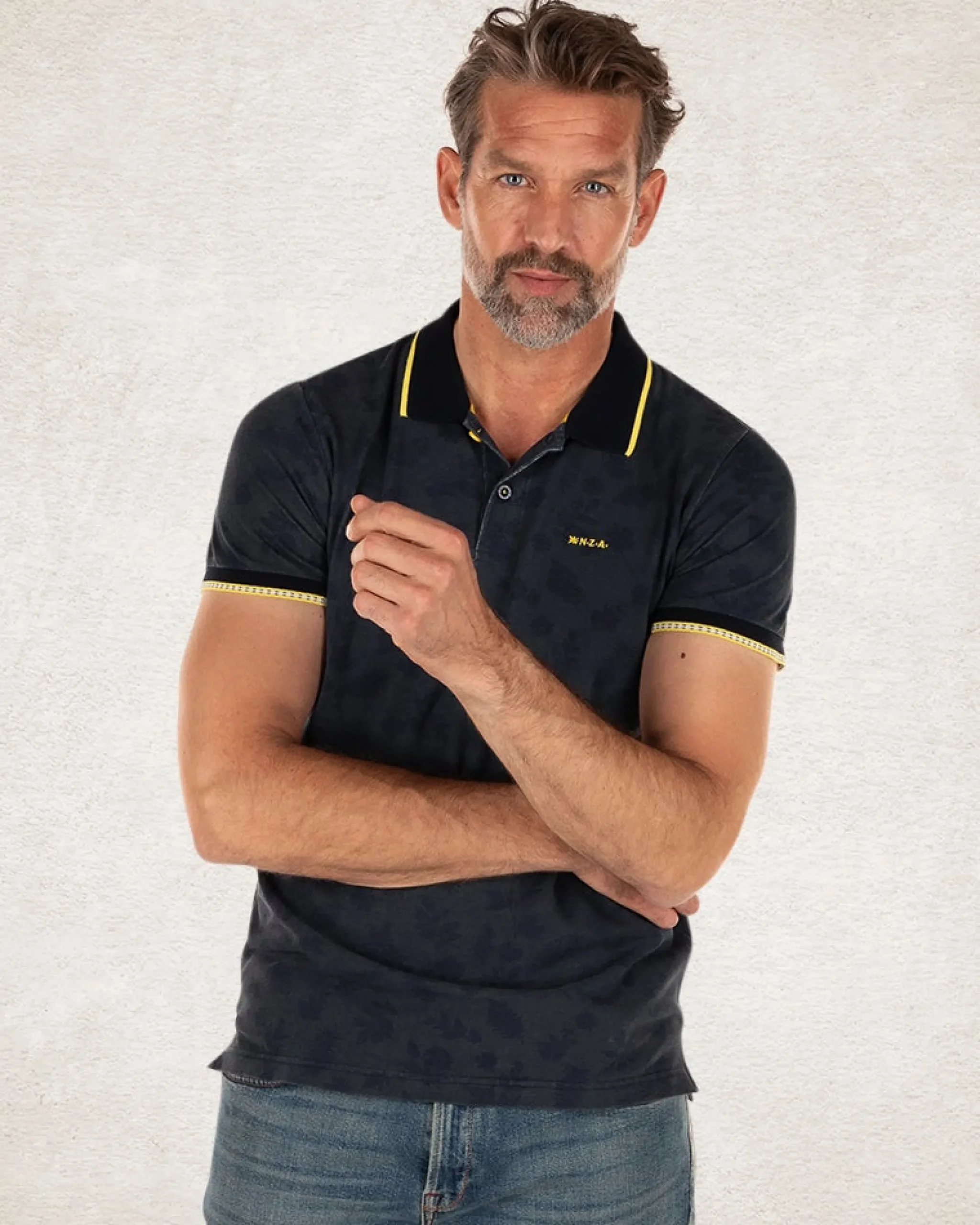 NZA New Zealand Auckland Donkerblauwe polo met bladprint