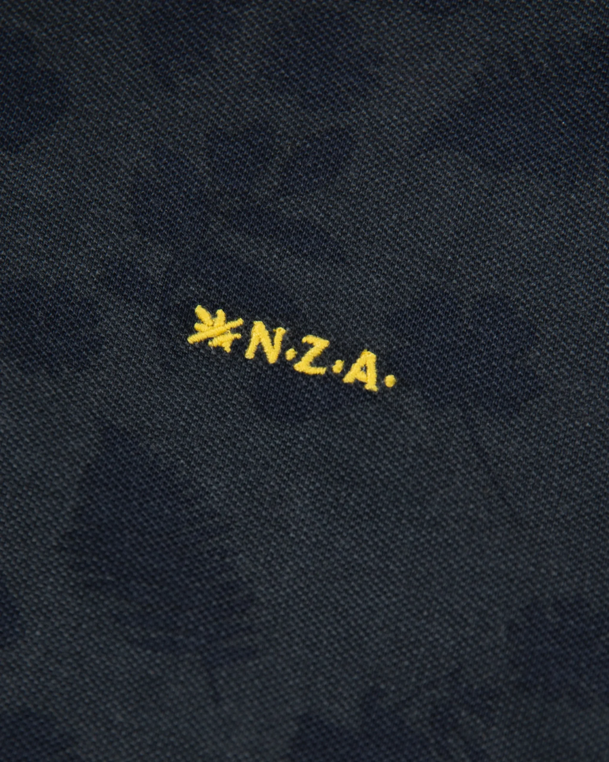 NZA New Zealand Auckland Donkerblauwe polo met bladprint