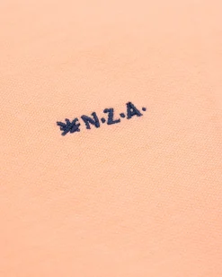 NZA New Zealand Auckland Effen katoenen lichtoranje polo