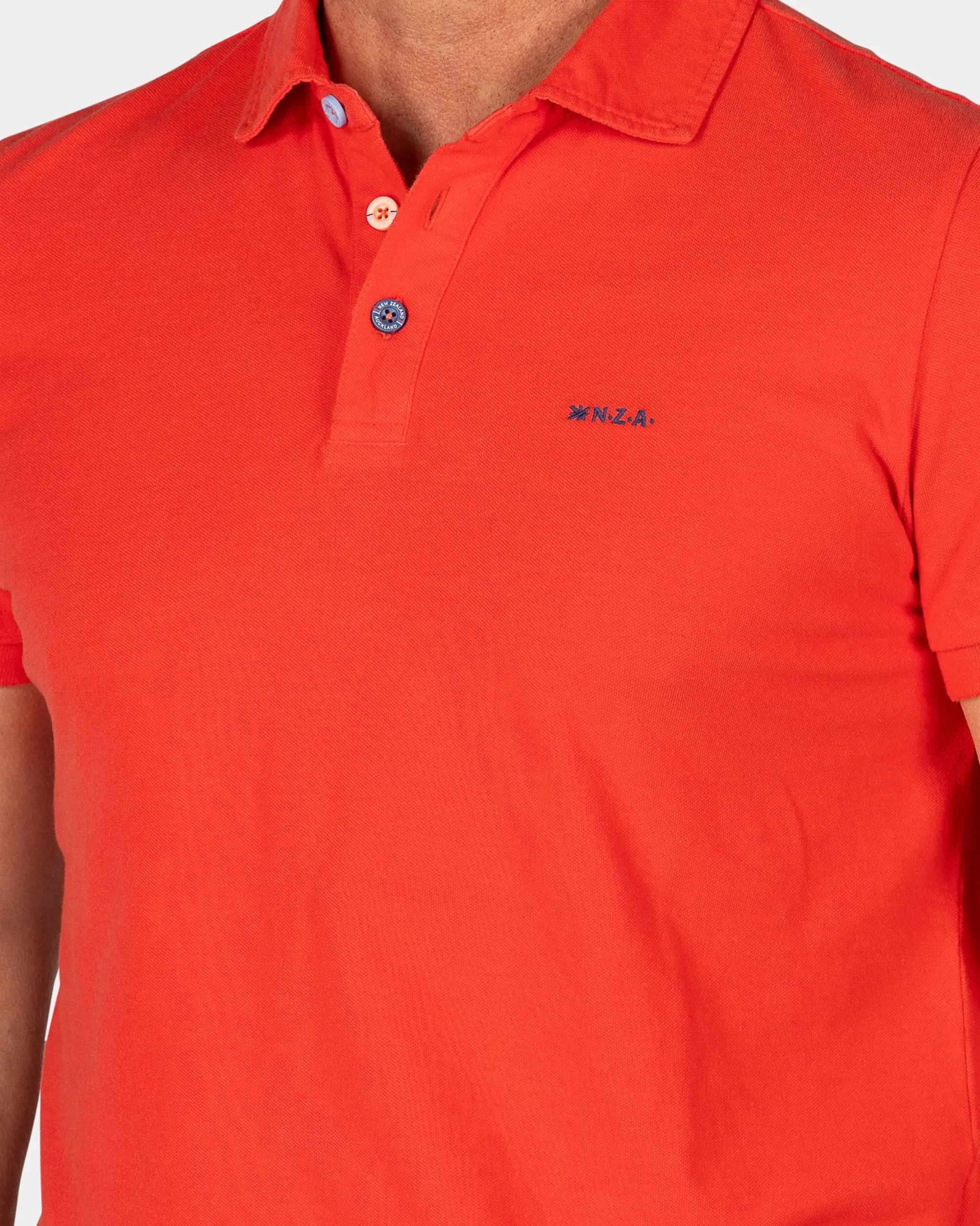 NZA New Zealand Auckland Effen katoenen roodoranje polo