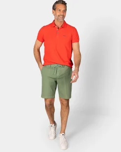 NZA New Zealand Auckland Effen katoenen roodoranje polo