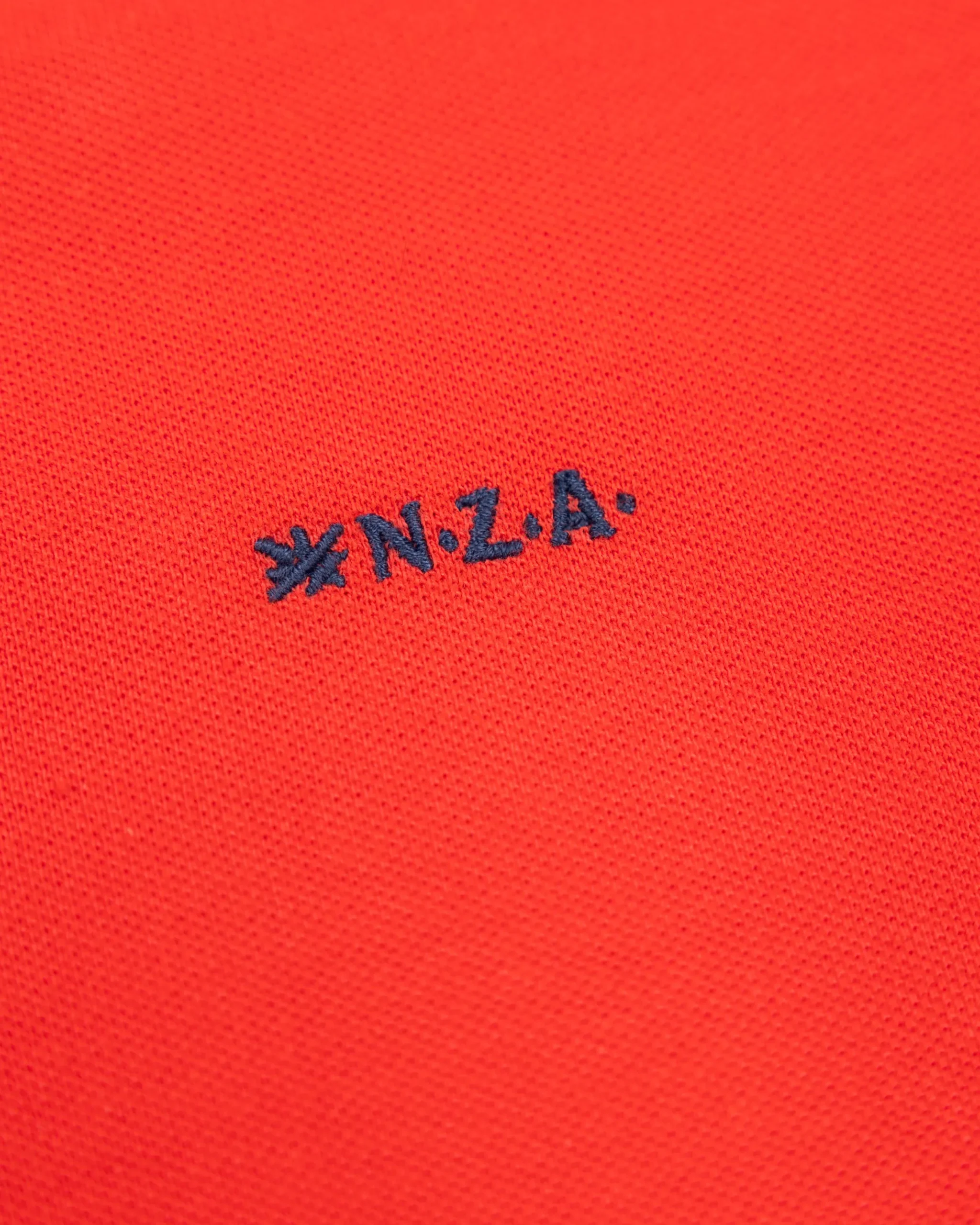NZA New Zealand Auckland Effen katoenen roodoranje polo