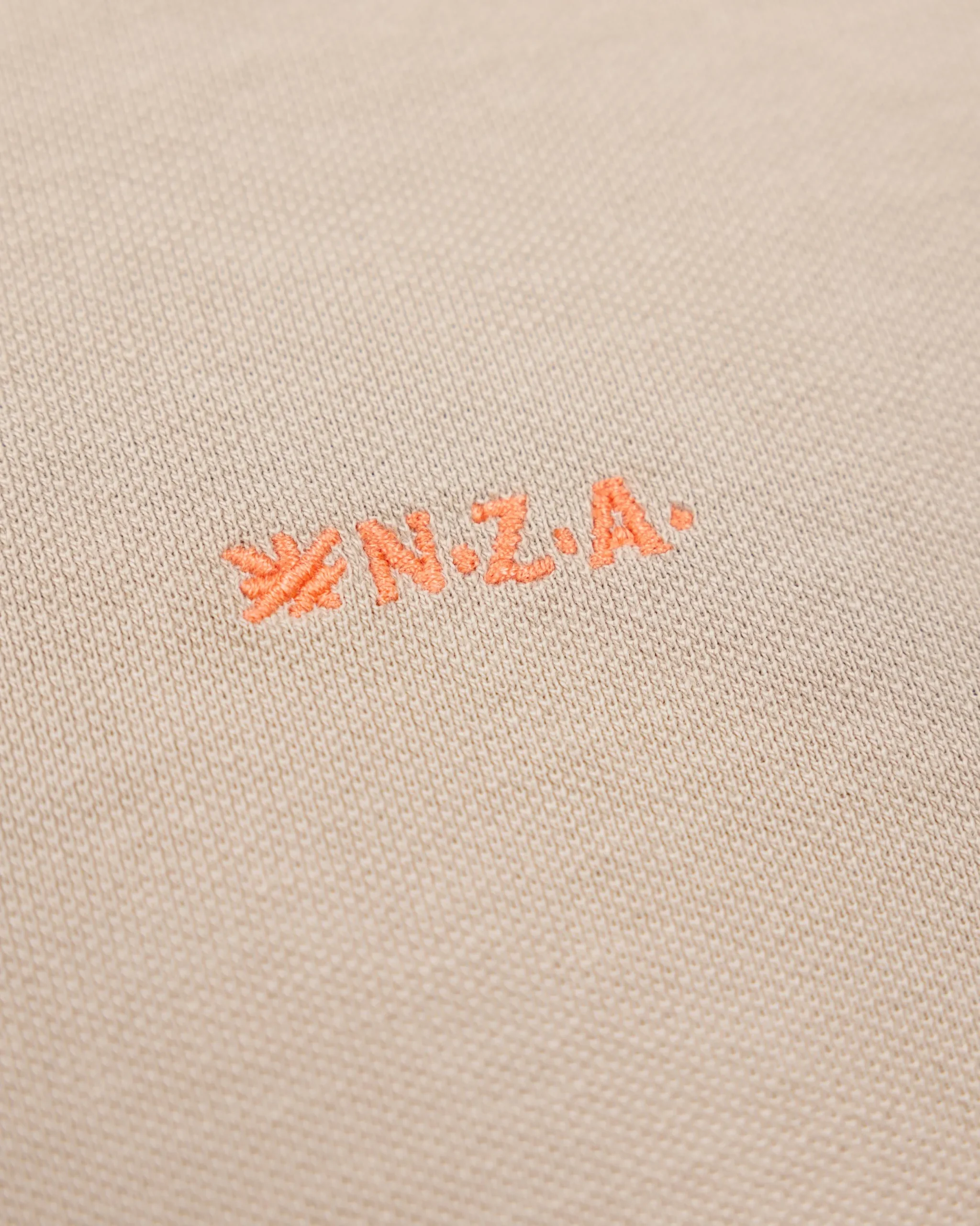 NZA New Zealand Auckland Effen katoenen zandkleurige polo