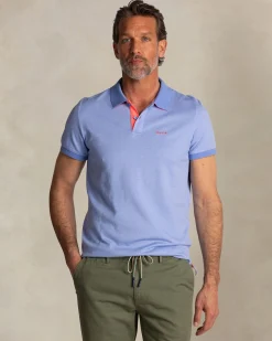 NZA New Zealand Auckland Effen lichtblauwe polo met oranje details