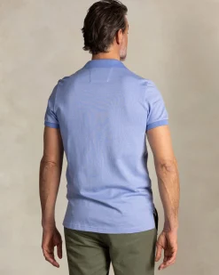 NZA New Zealand Auckland Effen lichtblauwe polo met oranje details