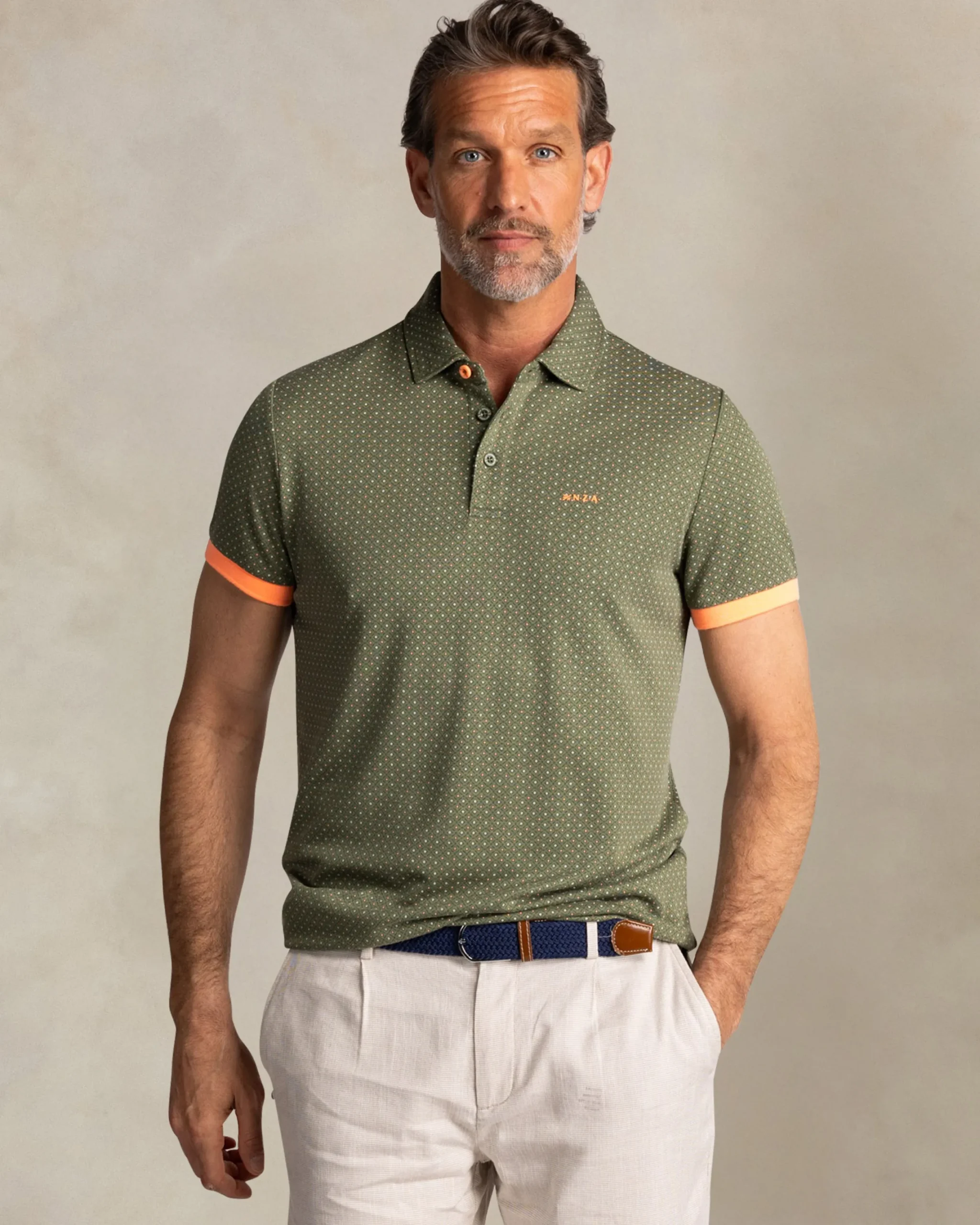 NZA New Zealand Auckland Groene polo met kleine oranje stippen