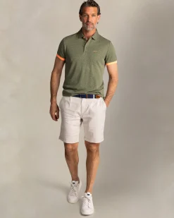 NZA New Zealand Auckland Groene polo met kleine oranje stippen