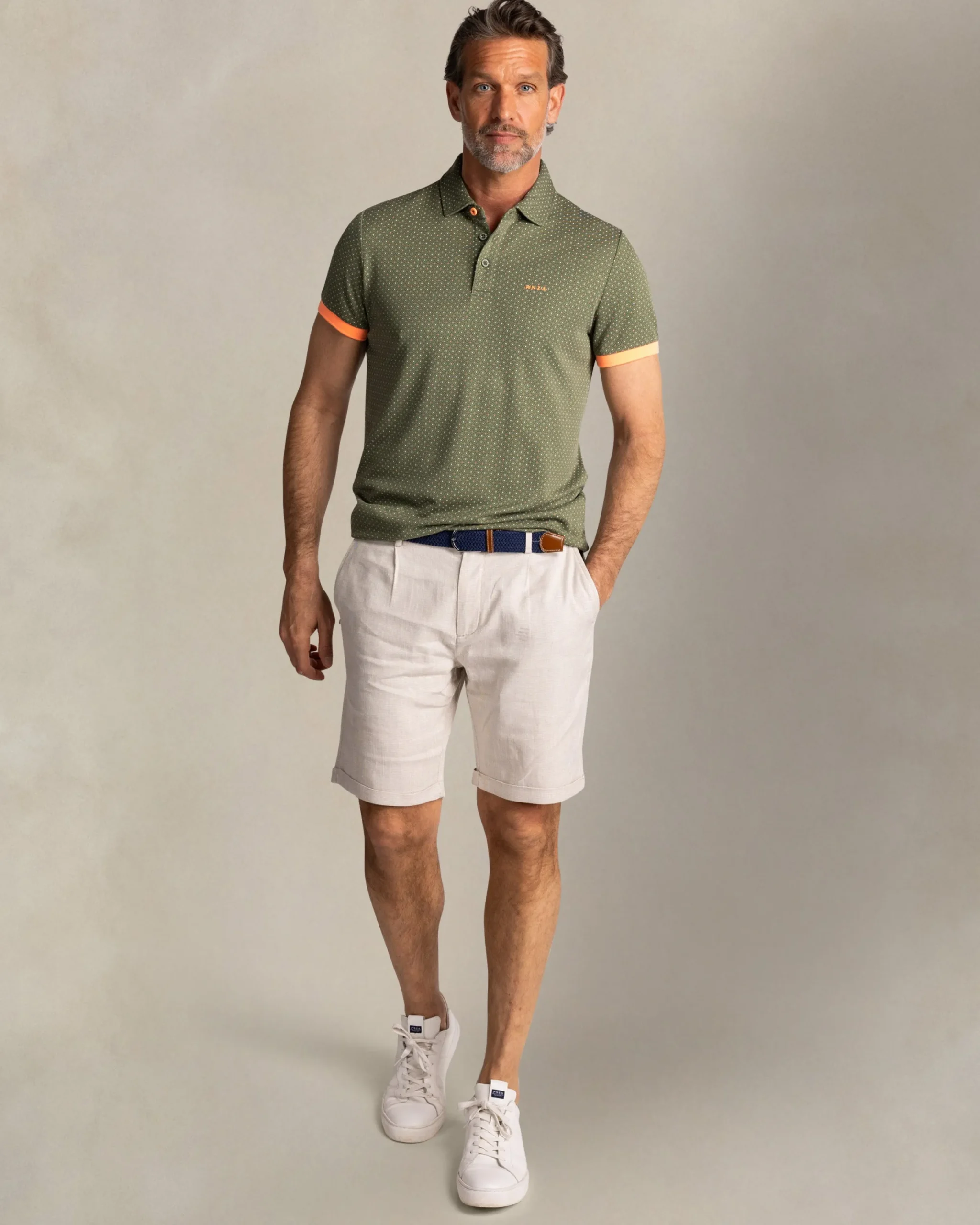 NZA New Zealand Auckland Groene polo met kleine oranje stippen