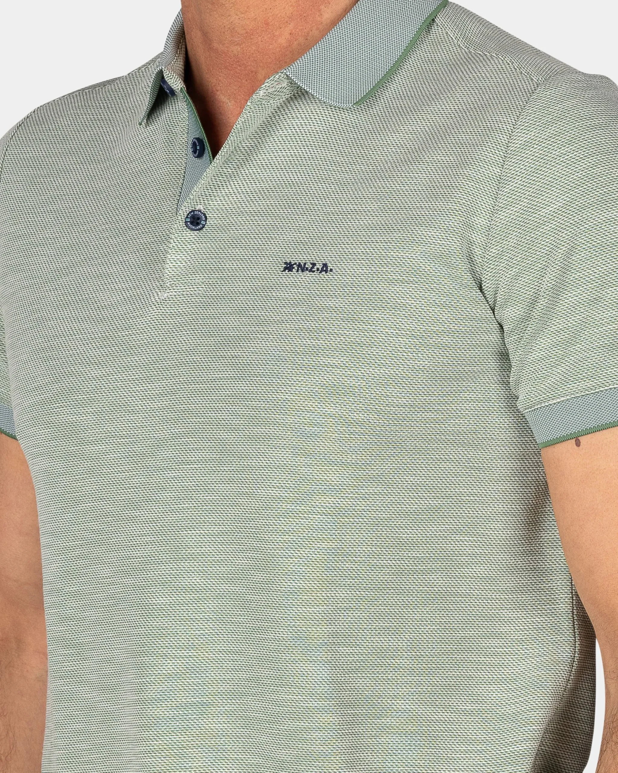 NZA New Zealand Auckland Lichtgroene polo met modaal