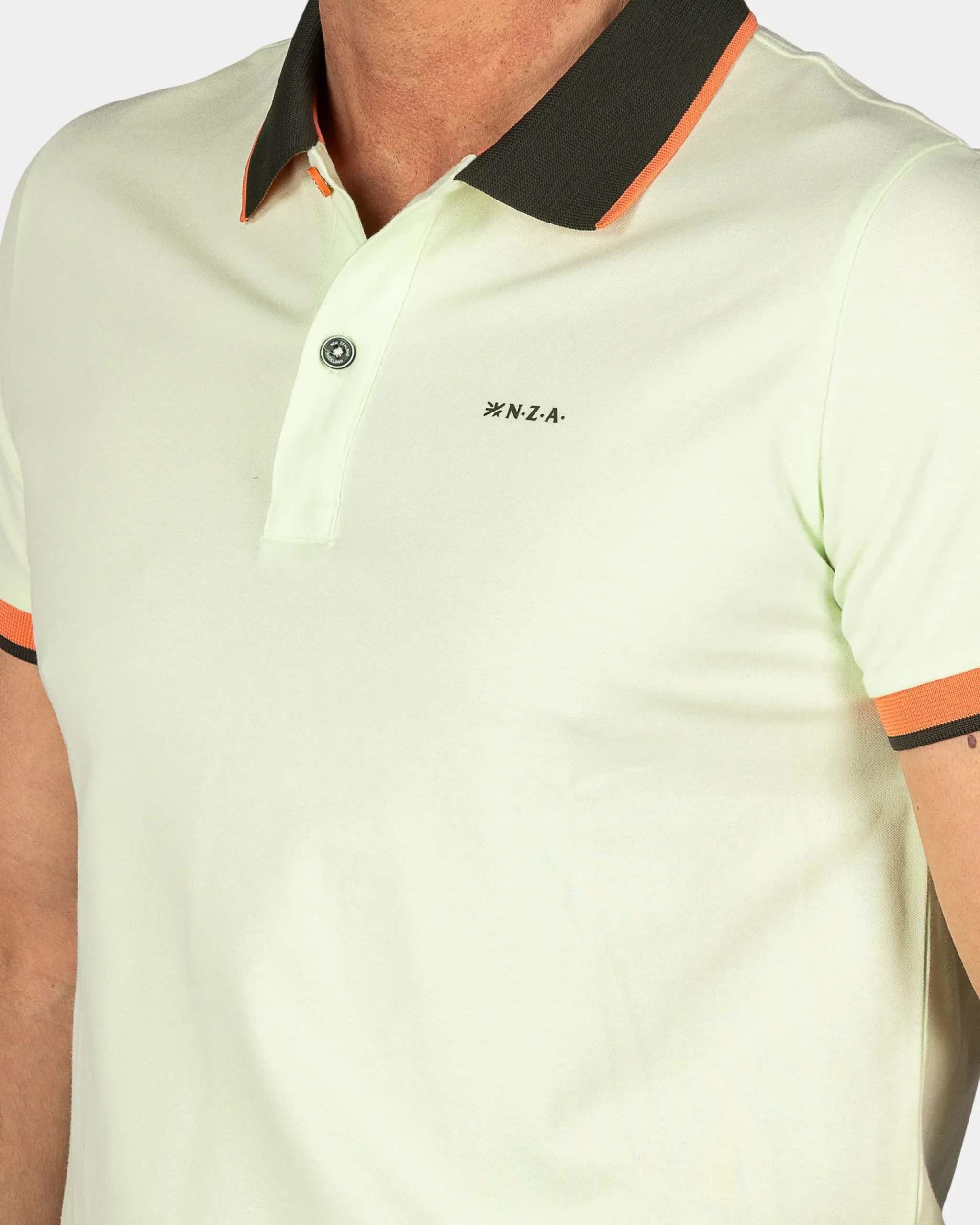 NZA New Zealand Auckland Mintgroene polo met blauwe kraag